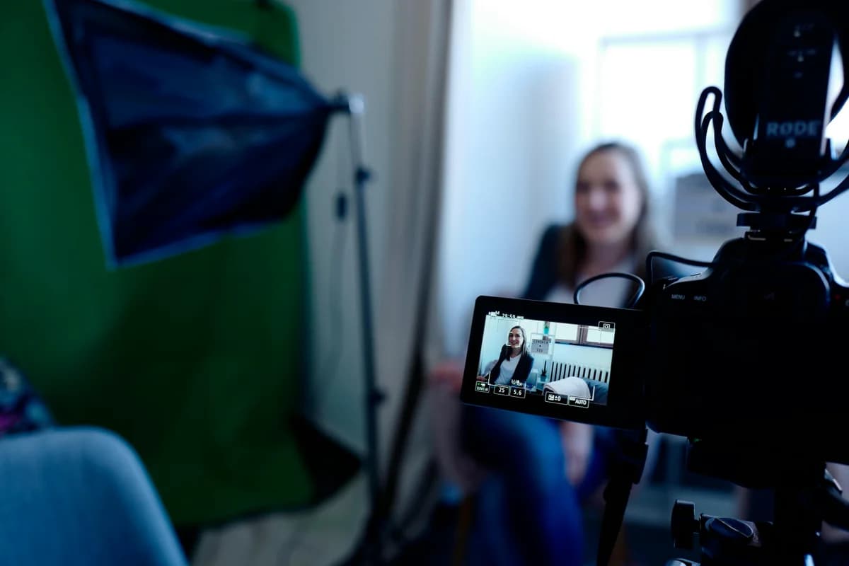 Camera with a monitor recording a business video interview