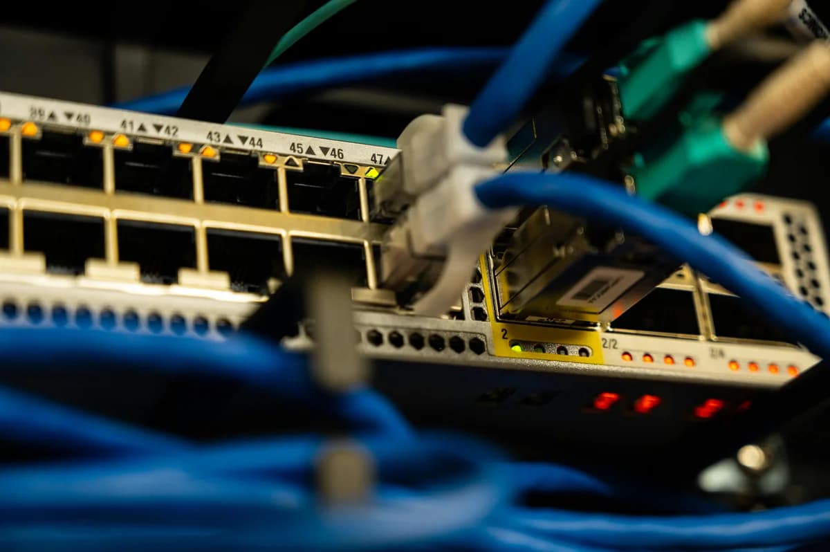 Network switch with ethernet cables - RTMP, SRT and WHIP ingest into dcast